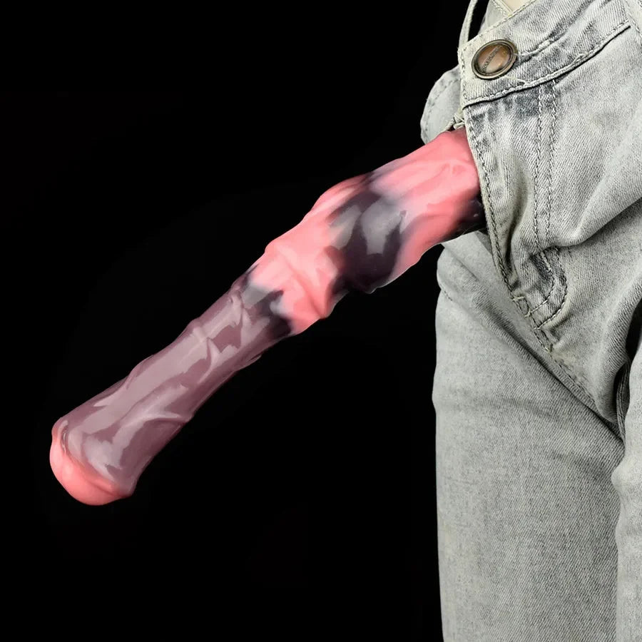 Xinghaoya 10-inch pure silicone horse dildo in pink and grey tones tucked into denim jeans pocket